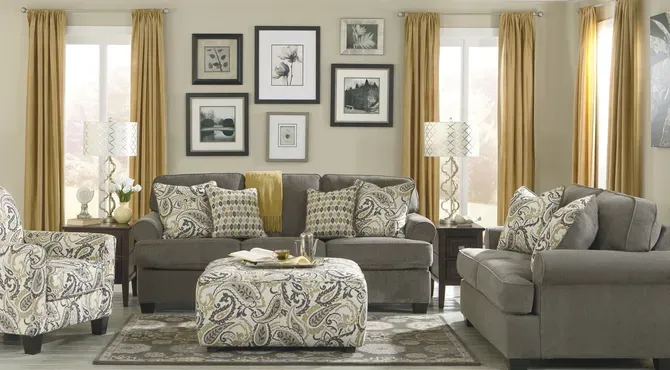 Cozy living room featuring a gray sofa, decorative pillows
